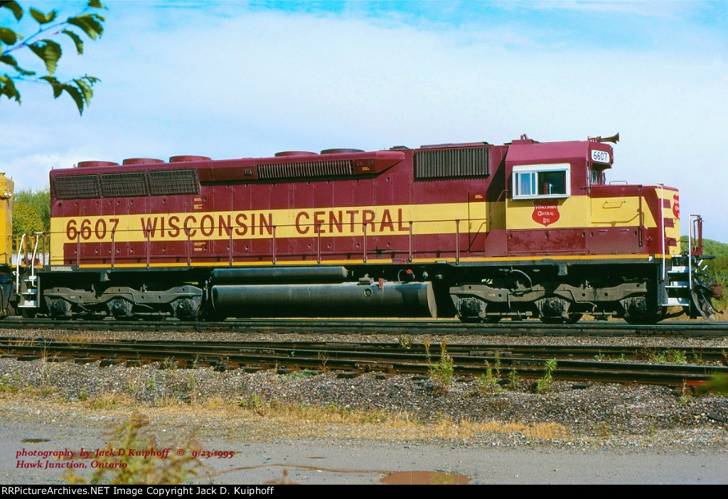 WC, Wisconsin Central EMD SD45u 6607, at Hawk Junction, Ontario. September 23, 1995. 